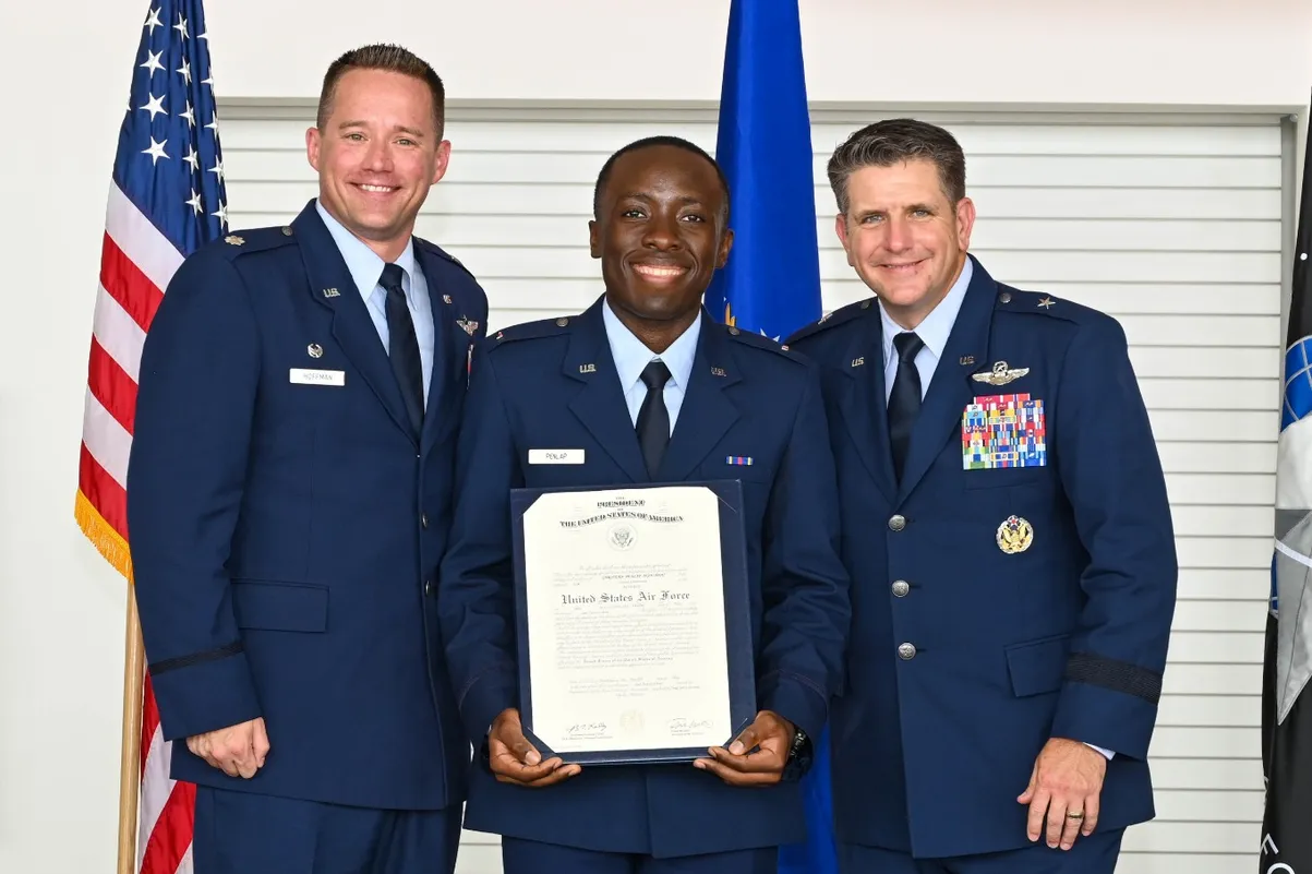 Air Force ROTC cadets celebrate at their field training graduation ceremony