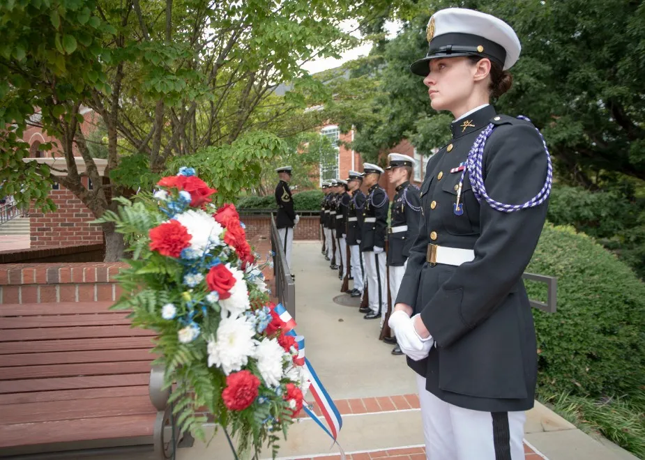 Army ROTC cadets rendering honors during a campus ceremony