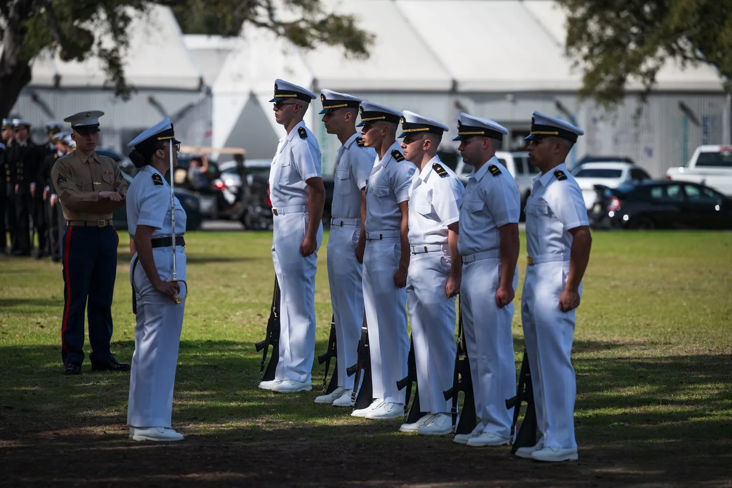 ROTC cadets from multiple branch units competing side by side at a university field meet