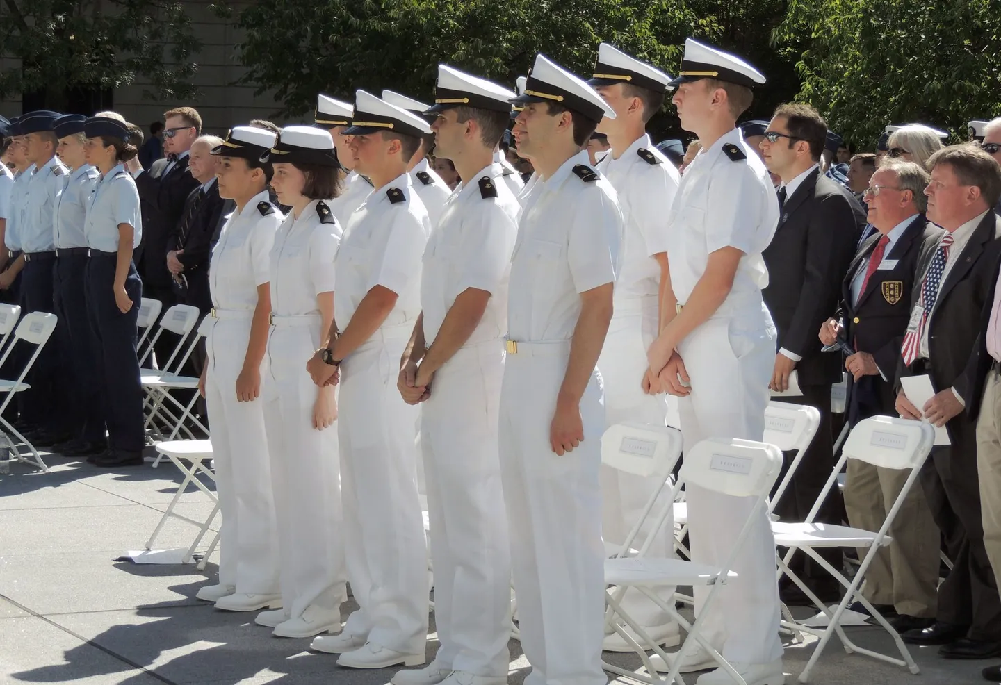NROTC midshipmen in dress uniform standing in formation